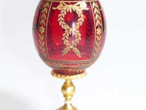 Faberge egg on gilt metal base.