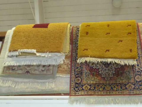 Two small carpets, Indian and Chinese rugs, Persian design runner and...