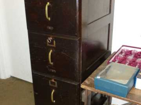 Oak four drawer filing cabinet