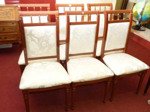 Set of six polished walnut panel back dining chairs