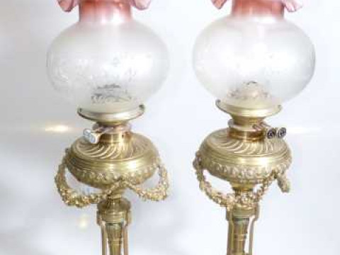 Good quality pair of ornate brass oil lamps with etched and ruby tinted...
