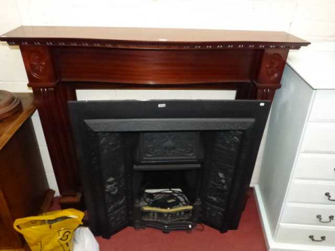 Mahogany fire surround and cast fireplace