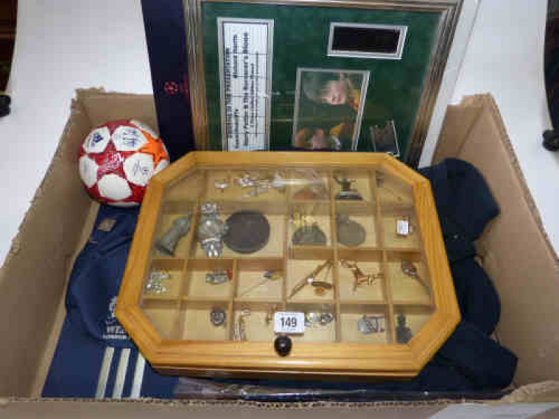 Box of Champions League Wembley London Final 2011 memorabilia and a glazed case of coins, jewellery and a wrist watch