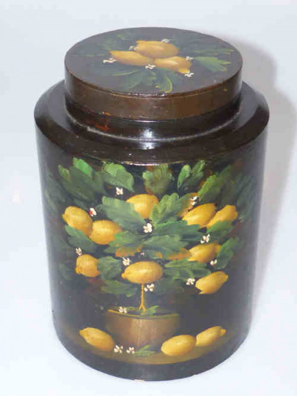 A circular wooden storage box painted with fruit