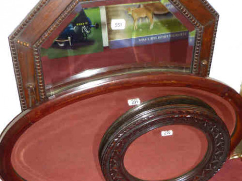 Three wooden framed wall mirrors