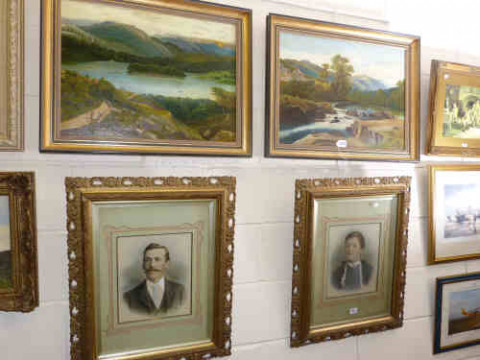 Pair of framed oil paintings, lake and river landscapes, signed E E Smith...