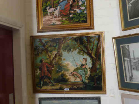 Three framed woolwork pictures