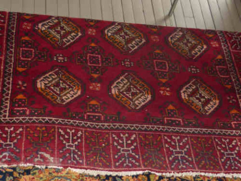 Red ground eastern style rug, 2.72 X 1.4m