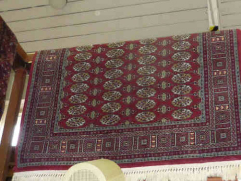 Red ground Hali Persian design rug, 1.7 X 1.2