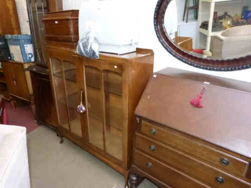 Three drawer oak bureau, walnut two door china cabinet, mahogany double corner cabinet and walnut cabriole leg tow door cabinet (4)