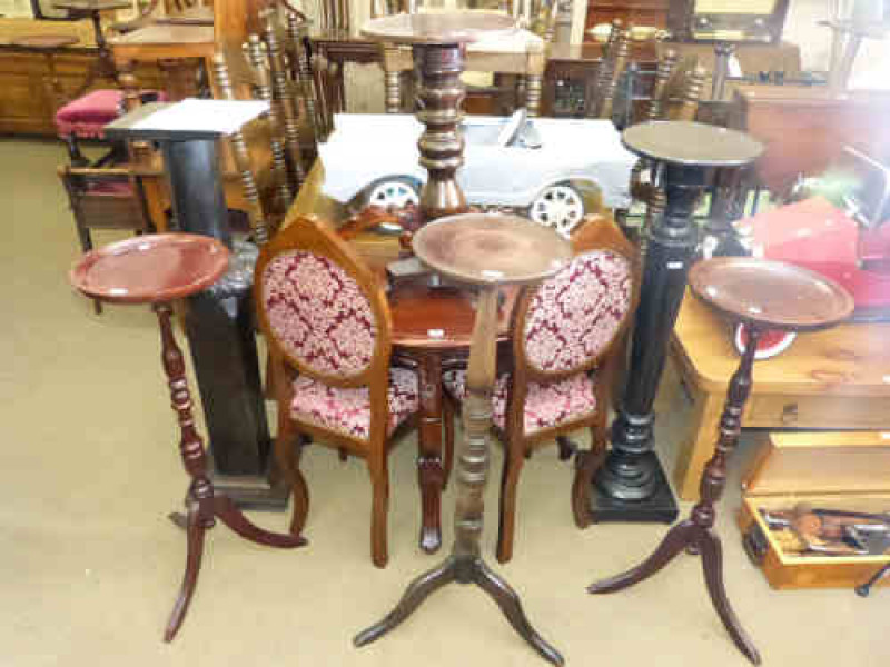 Mahogany demi-lune hall table, pair side chairs, three torcheres and three tripod plant stands (9)