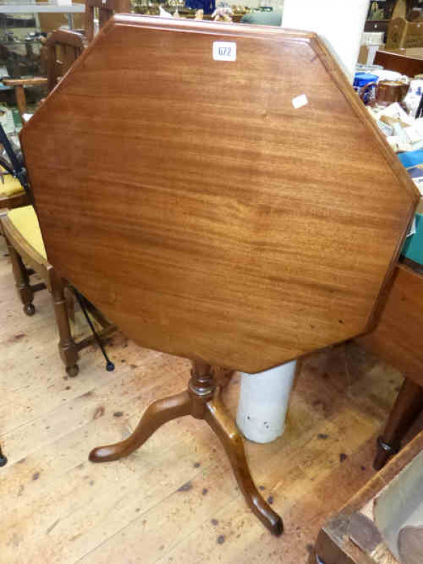 Octagonal mahogany snap top supper table on pedestal tripod base
