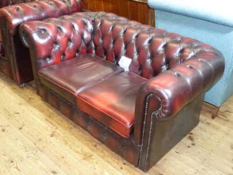 Ox Blood buttoned leather two seater chesterfield settee
