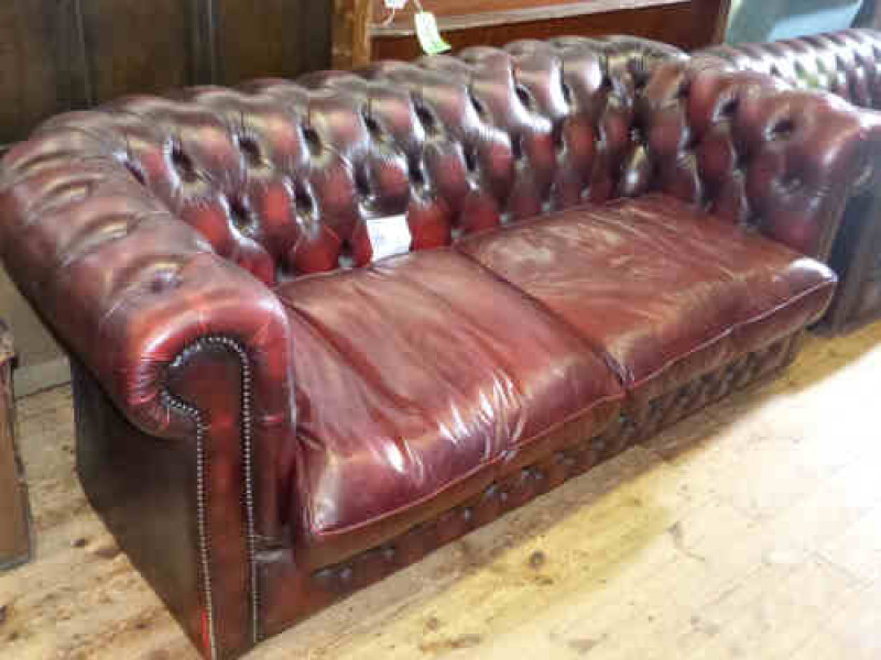 Ox Blood buttoned leather three seater chesterfield settee