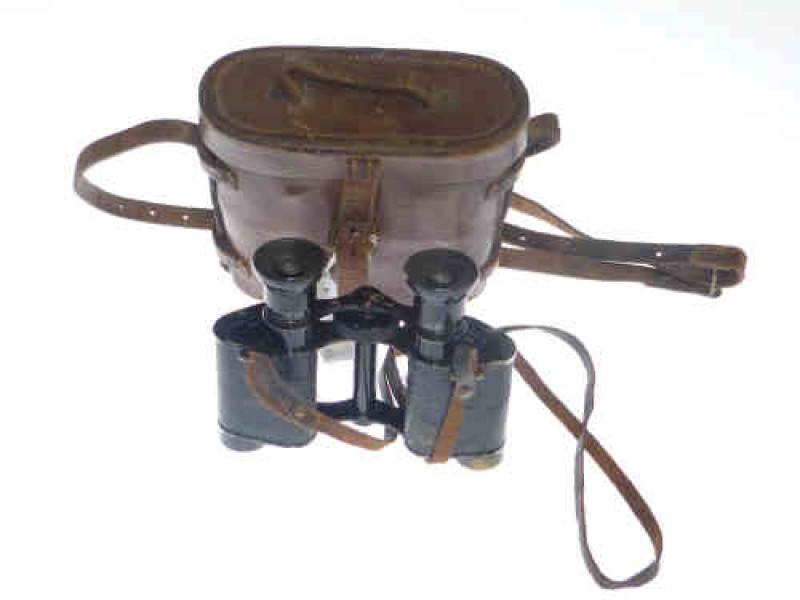 Pair of WWI binoculars in brown leather case retailed by Garstin London 1916