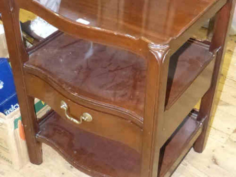 Pair Georgian style mahogany serpentine front three tier side tables
