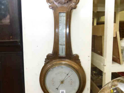 Carved oak banjo barometer