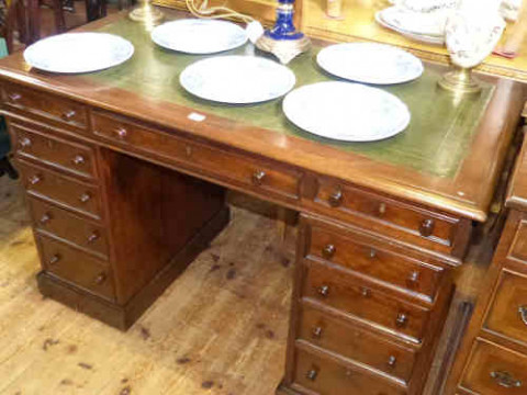 Victorian mahogany pedestal desk having three frieze drawers above two...