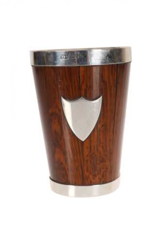 A late Victorian silver mounted and oak beaker, Birmingham 1893, maker H&T, of coopered tapering form. 12cm