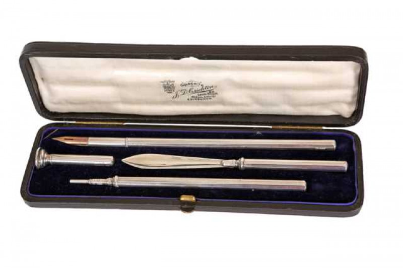 A late Victorian silver writing set, Birmingham 1892, in a fitted case.
