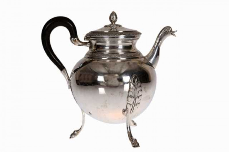 A small Continental silver teapot, probably French, circa 1900, with duck cast spout, bands of anthemion and acanthus capped C-scroll legs terminating in hooves. 8.9 troy ozs, 14cm to top of handle