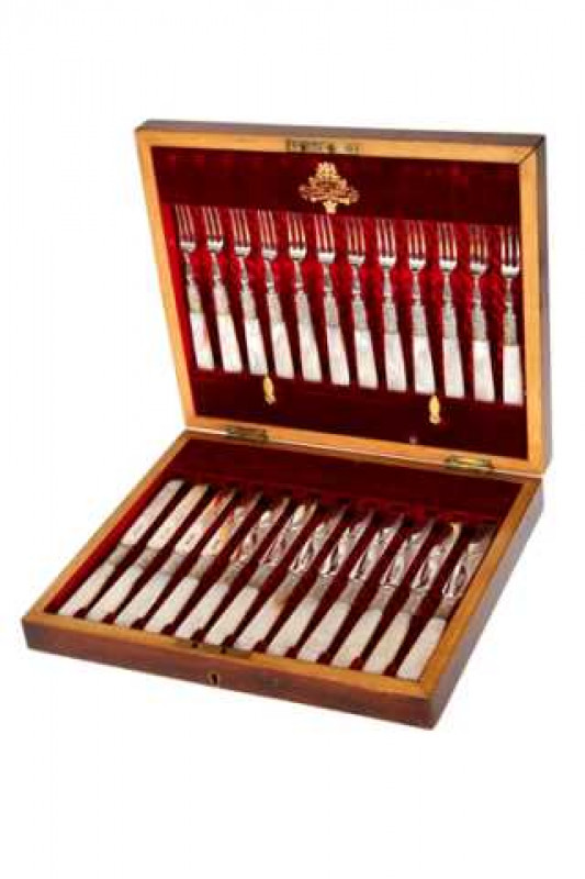 A set of twelve Victorian silver and mother-of-pearl dessert knives and forks, Sutherland & Roden, Sheffield 1898, in a fitted walnut box with engraved brass cartouche.