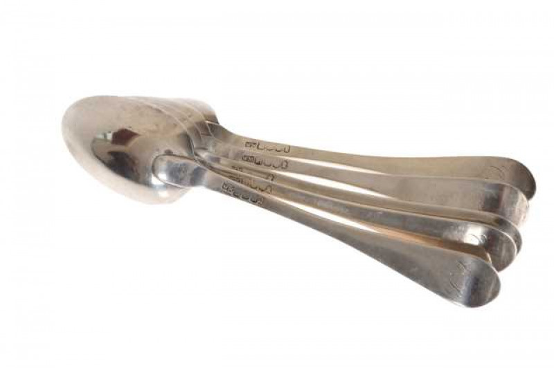 A set of five Scottish silver tablespoons, Edinburgh 1806, maker WM, Hanoverian pattern, engraved with initials verso. Approximately 10.4 troy ozs, 21cm