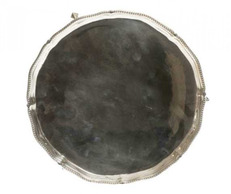 A George III silver salver, Hester Bateman, London 1787, with beaded rim and ball and claw feet. Approximately 12 troy ozs, 23cm