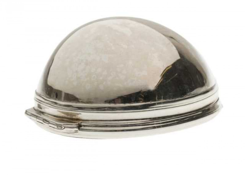 A silver snuff box in the form of a cowrie shell, indistinct marks, engraved with a monogram. Approximately 3 troy ozs, 9cm