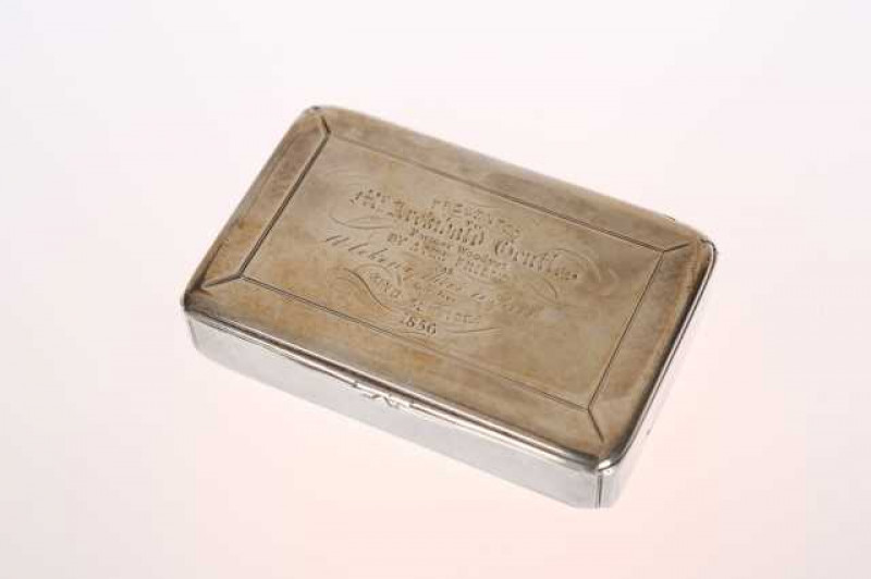 A Scottish silver snuff box, James Nasmyth, Edinburgh 1832, rectangular with hinged cover and presentation inscription dated 1856. Approximately 3 troy ozs, 8cm by 5cm