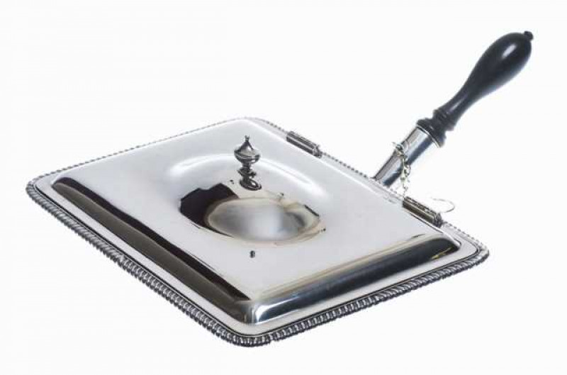 An Edwardian silver cheese dish, Garrard & Co Ltd, London 1907, rectangular with domed hinged cover and gadrooned rim, turned wooden handle. Total weight approximately 48 troy ozs, 25.5cm wide
