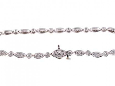 Tiffany: A diamond bracelet, the eighteen articulated leaf shaped links...