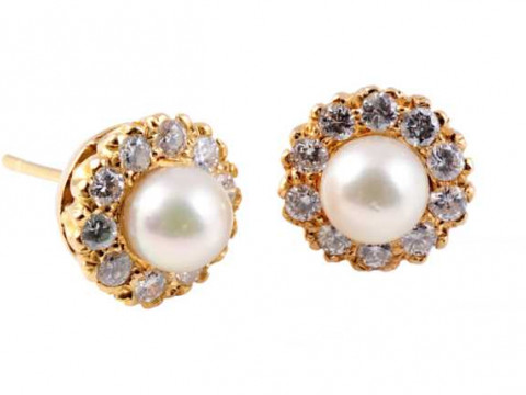 A pair of diamond and cultured pearl ear studs, the cultured pearl set...