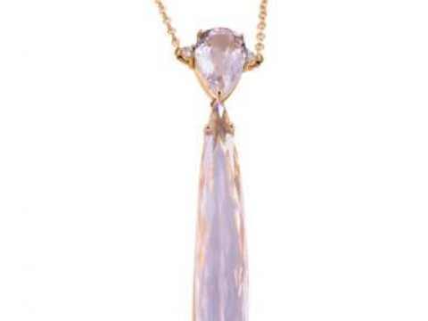 A kunzite and diamond necklace, the large tapering pear cut kunzite four...