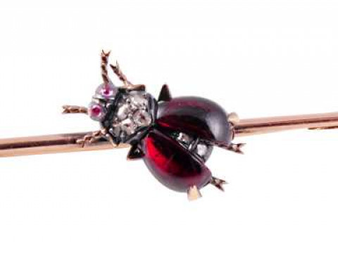 A garnet, diamond and seed pearl brooch, circa 1870, modelled as a fly...