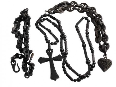 Three Victorian jet necklaces, the first of thirty three oval shaped articulated...