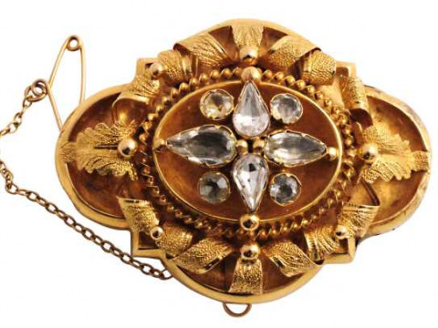 A Victorian white stone locket mourning brooch, set to the top with four...