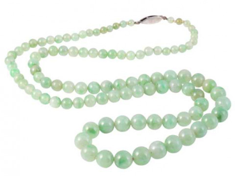 A jadeite beaded necklace, the one hundred and two graduating jadeite...