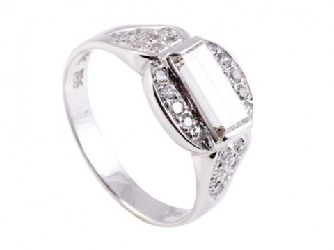 A diamond ring, the oval shaped mount set to the centre with a horizontal...
