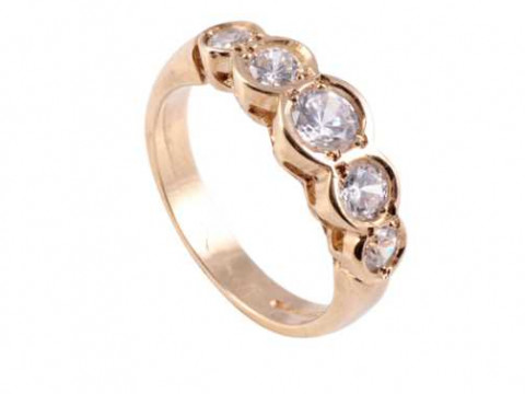 A diamond ring, the five graduating brilliant cut collet set diamonds...