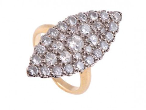 A diamond ring, the marquise shaped mount set to the entirety with thirty...