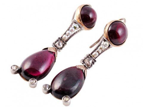 A pair of garnet, seed pearl and diamond earrings, circa 1800, the oval...