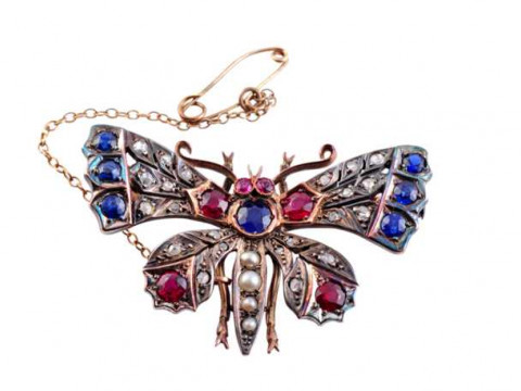 A Victorian diamond, sapphire, ruby and seed pearl butterfly brooch, the...