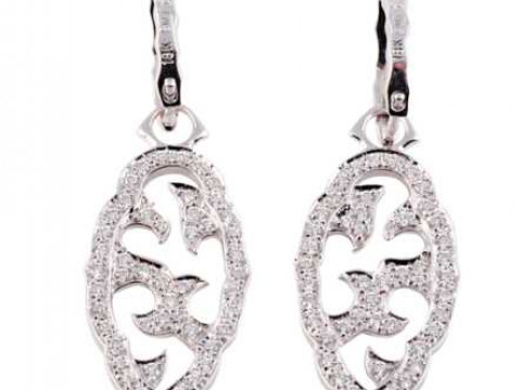 Steven Webster: A pair of diamond drop earrings, the moulded oval shaped...