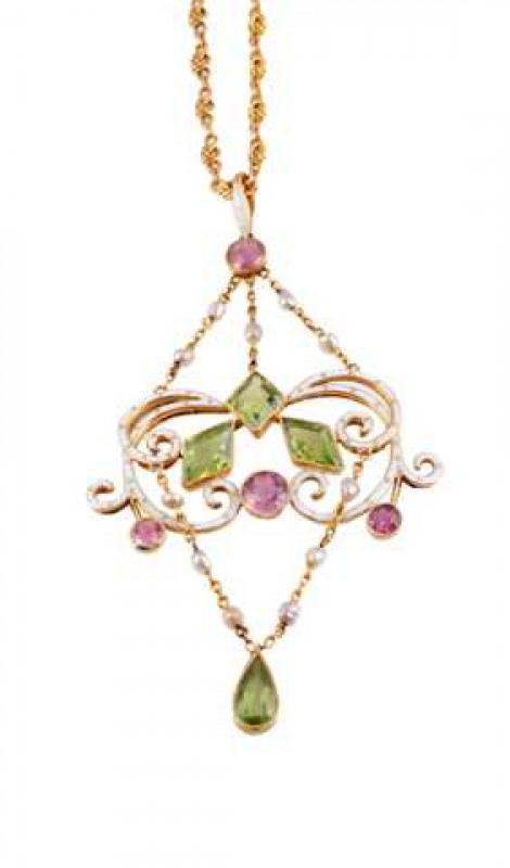 A peridot, pink tourmaline, seed pearl and enamel pendant, circa 1890-1900, the delicate symmetrical design of swirling white enamel set to the centre with three millegrain set square cut peridots above three evenly spaced round cut graduating millegrain 