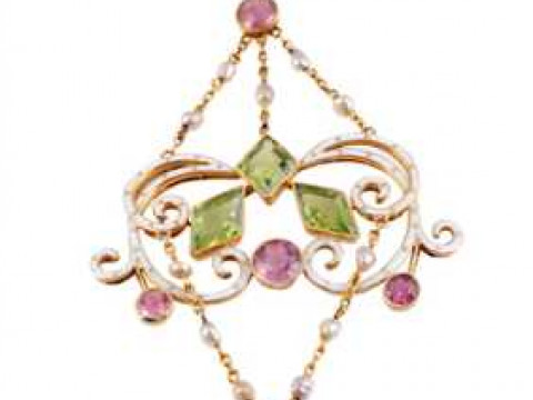 A peridot, pink tourmaline, seed pearl and enamel pendant, circa 1890-1900,...