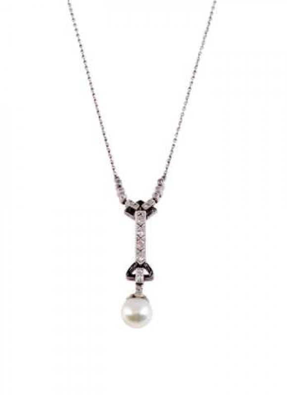 A pearl, diamond and black enamel pendant, circa 1920, the natural saltwater pearl set to the top with four diamond highlights, suspending on an articulated link from two old brilliant cut diamonds in a rectangular bar mount with black enamel terminal, to