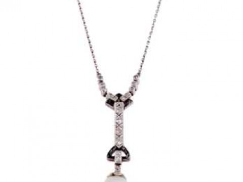 A pearl, diamond and black enamel pendant, circa 1920, the natural saltwater...