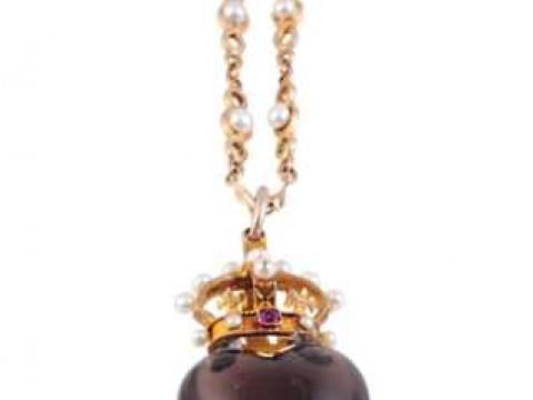 A smoky quartz, seed pearl and garnet pendant, the large heart shaped...