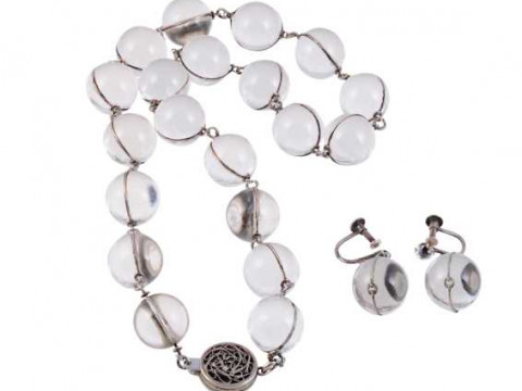 A rock crystal necklace, the twenty uniform rock crystal beads as articulated...